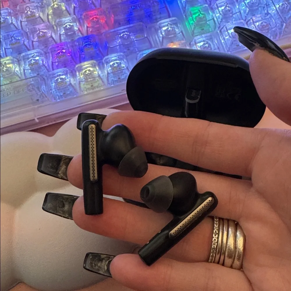 Poly wireless black headphones with charging case